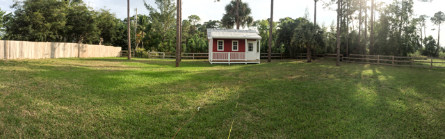 Photo of: Wide angle view of the new pump house at the back of Howie's Homestead